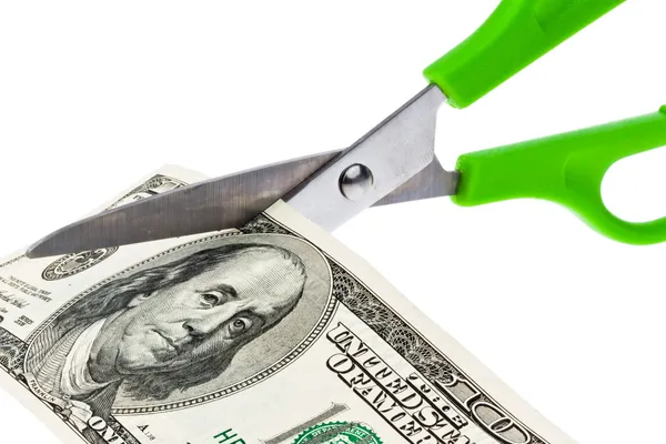 Dollar currency notes and scissors — Stock Photo, Image