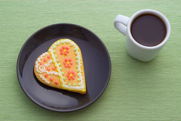 Heart ice biscuit and coffee — Stock Photo, Image