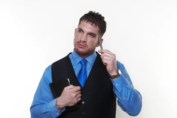 Homme d'affaires portant une chemise et cravate dans un gilet — Photo