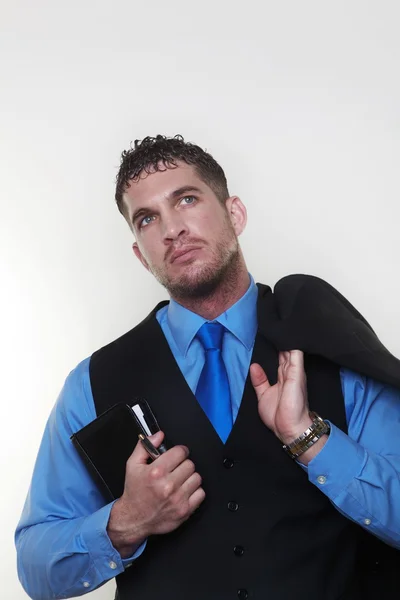 Uomo d'affari che indossa una camicia e cravatta in un gilet — Foto Stock