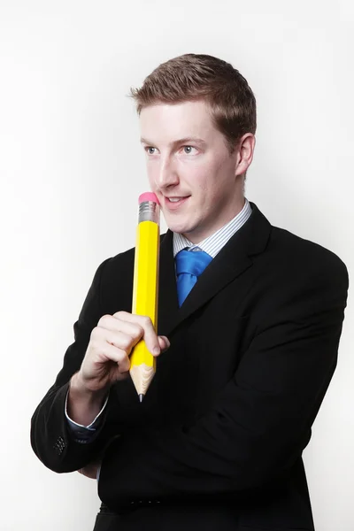 Man with large pencil — Stock Photo, Image