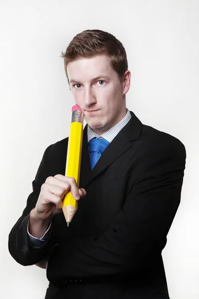Muž s velkými tužka — Stock fotografie