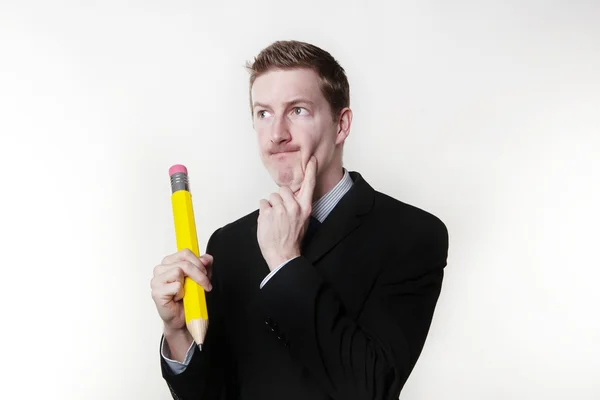 Homem com lápis grande — Fotografia de Stock
