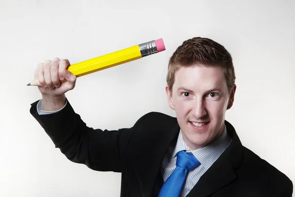 Getting mad with a large pencil — Stock Photo, Image