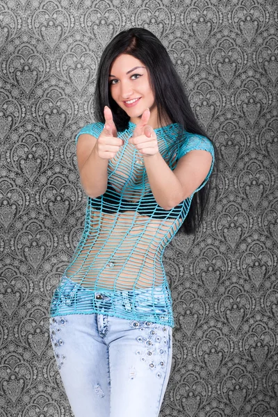Cheerful positive brunette in a transparent shirt — Stock Photo, Image