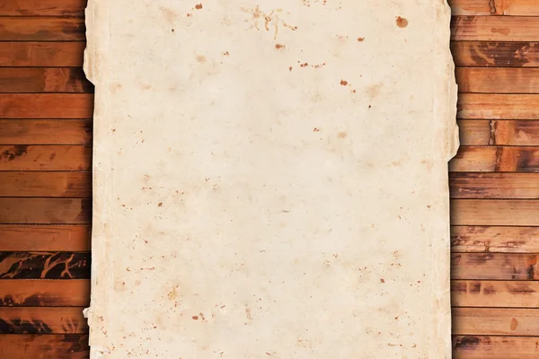 Starodawny stary papier na tle drewniane — Zdjęcie stockowe