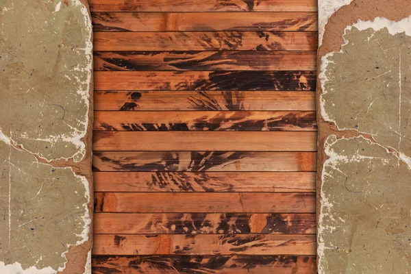Aged paper on a wooden background — Stock Photo, Image