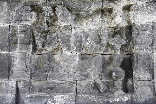在婆罗浮屠雕刻救济的细节 — 图库照片