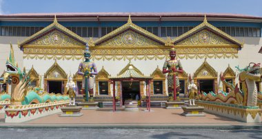 Sculpture at the Thai temple Wat Chayamangkalaram on island Pena clipart