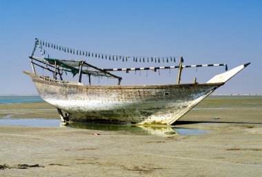 The old ship in the dried up sea , Oman