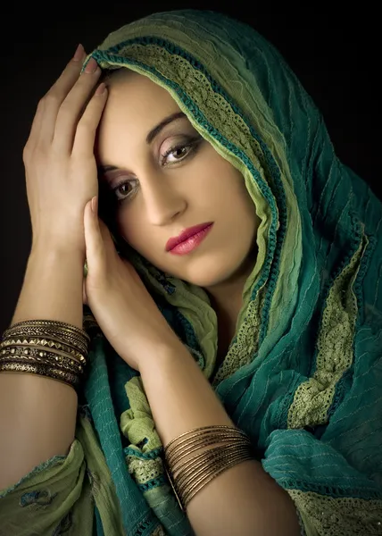 Portrait of young beautiful woman in traditional costume — Stock Photo, Image