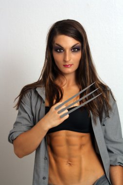 Sexy Brunette with Sharp Metal Claws clipart