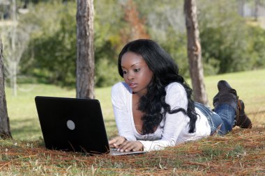 Beautiful Casual Woman Outdoors with Laptop (4) clipart