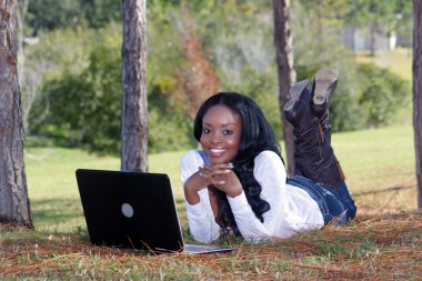 Beautiful Casual Woman Outdoors with Laptop (8) clipart