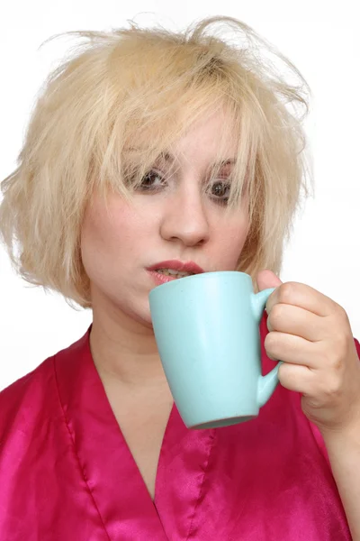 Chagrijnig Blonde drinken koffie (1) — Stockfoto