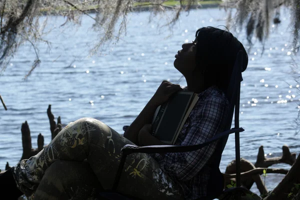 stock image Woman Reading Outdoors (4)