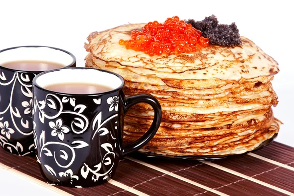 Tea and a pancakes with caviar — Stock Photo, Image