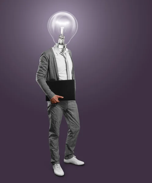 Lampa hlava podnikatel s notebookem — Stock fotografie