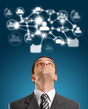 Businessman Looking Upwards in Social Network clipart