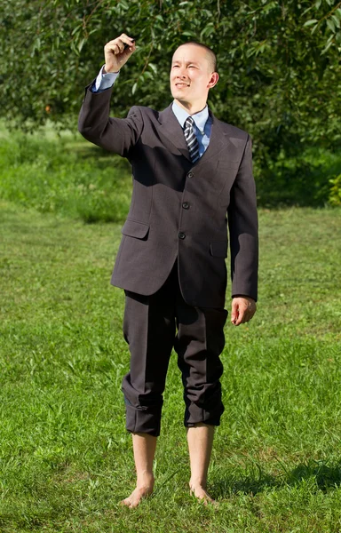 Schrijven van iets buiten zakenman — Stockfoto