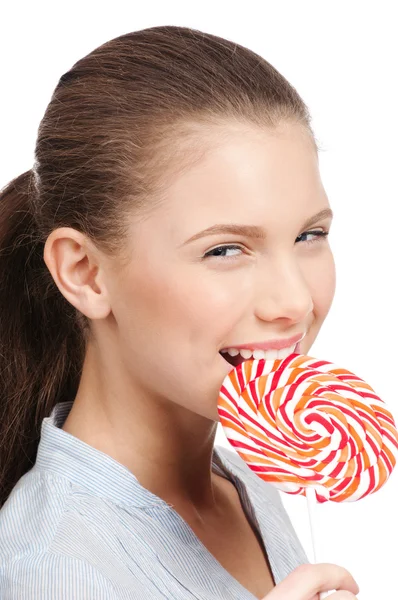 Ganska ung kvinna med lollipop. isolerade — Stockfoto