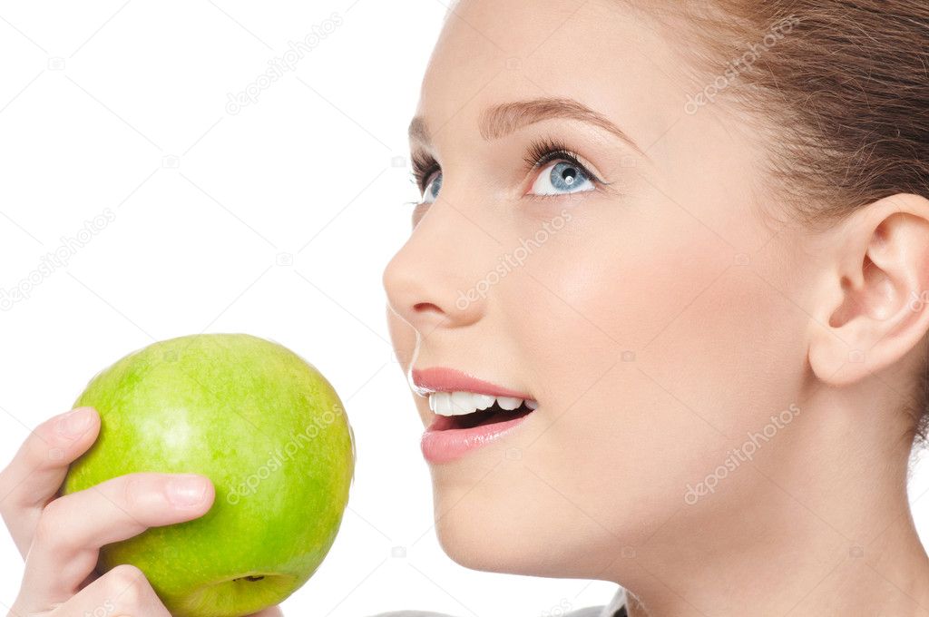 Young beauty woman with green apple