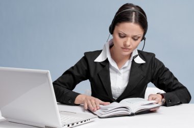 Business woman with headset communication clipart