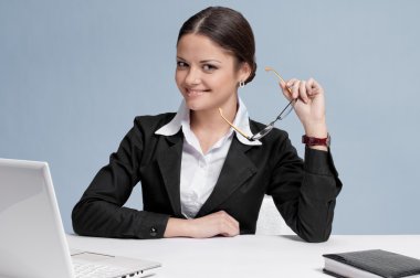 Business woman working in office place clipart