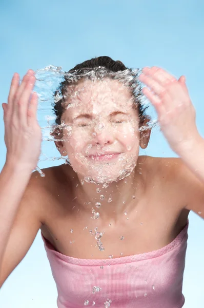 stock image Girl in bath that washing face in cold water