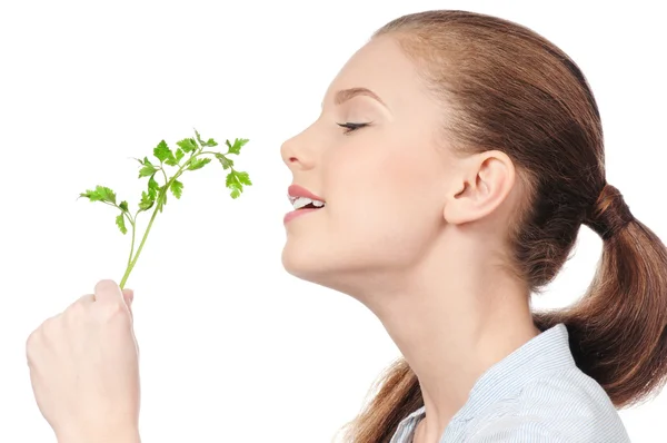 Young beauty woman with green parsley — Stock Photo, Image