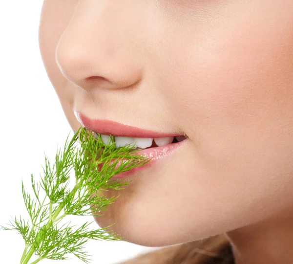 Young beauty woman with green dill — Stock Photo, Image