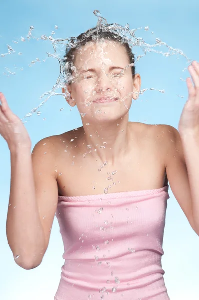 stock image Girl in bath that washing face in cold water