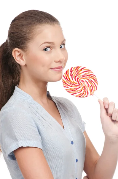 Ganska ung kvinna med lollipop. isolerade — Stockfoto