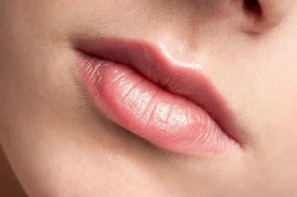 Los labios de cerca de la belleza mujer joven —  Fotos de Stock