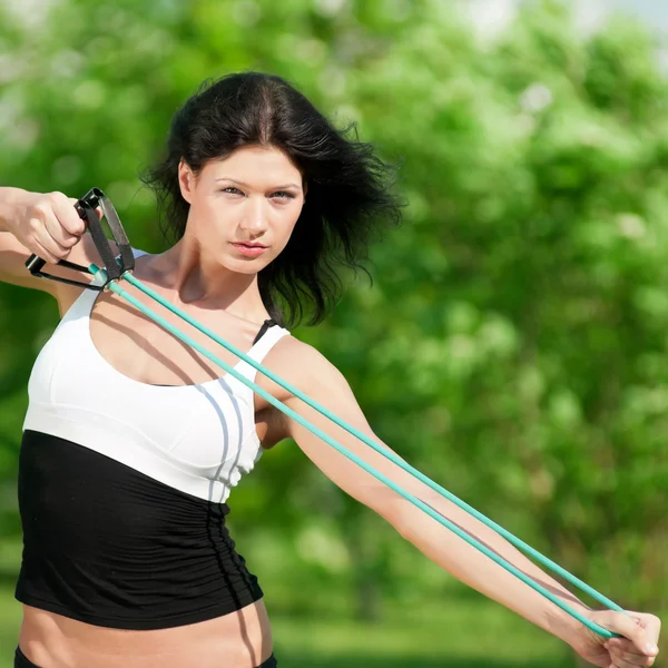 Mujer haciendo ejercicio de estiramiento. Yoga — Foto de Stock