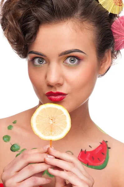 Close up portrait of young emotional woman with lemon canape — Stock Photo, Image