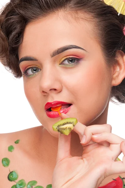 Close up portrait of young emotional woman with kiwi canape — Stock Photo, Image
