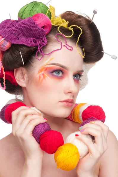 Closeup fashion woman with color face art in knitting style — Stock Photo, Image