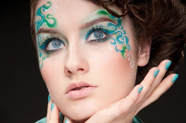 Close-up portrait of sprite girl with faceart — Stock Photo, Image
