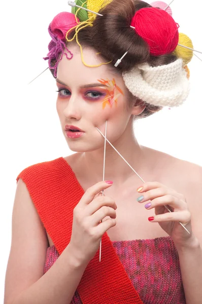 Closeup fashion woman with color face art in knitting style — Stock Photo, Image