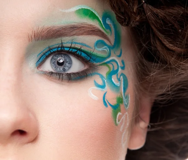 Half face portrait of sprite girl with faceart — Stock Photo, Image