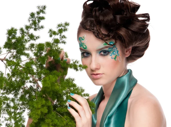 Detail dívky sprite s společnosti faceart a rostlina — Stock fotografie