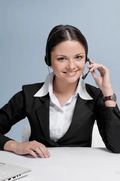 Mujer de negocios con comunicación de auriculares — Foto de Stock