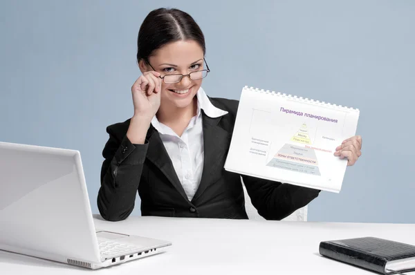 stock image Business woman in office show chart