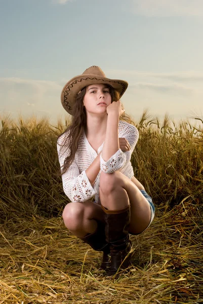 Beautiful slavonic girl in cowboy clothes — Stock Photo, Image