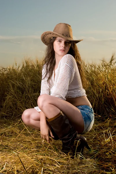 Menina escrava bonita em roupas de cowboy — Fotografia de Stock