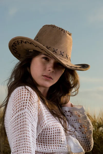 Beautiful slavonic girl in cowboy clothes — Stock Photo, Image