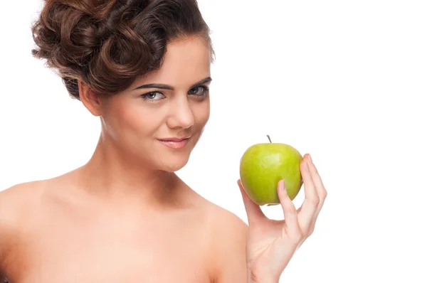 Primer plano retrato de la mujer de belleza con manzana verde Fotos de stock libres de derechos