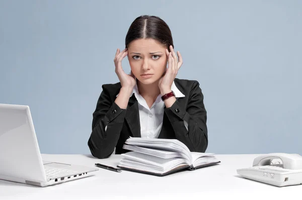 Sad business woman with personal organizer. Royalty Free Stock Images
