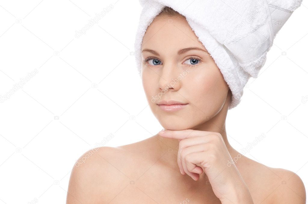 Beautiful girl with perfect skin and towel